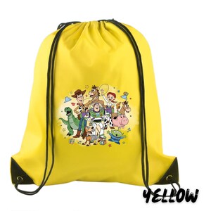 May include: A white ceramic mug with a black handle and the text "But First, Coffee" in a black, handwritten-style font. The mug is on a white surface.