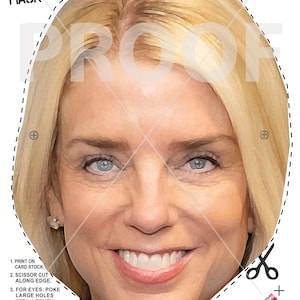 May include: A Halloween mask featuring a smiling woman with blonde hair and blue eyes. The mask has a dotted cutting line around the face and instructions for use. Text on the mask includes "Pam Bondi Halloween Mask" and a legal disclaimer.