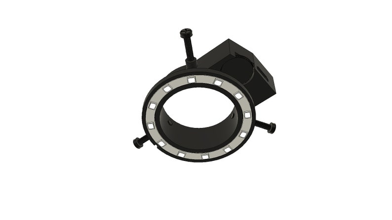 May include: Black ring light with a white LED strip and a mounting bracket. The ring light has four screws for attaching it to a surface.