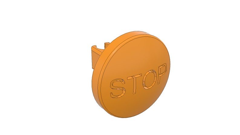 May include: Orange plastic stop button with the word "STOP" embossed on the front.