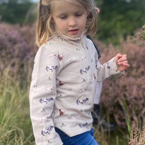 Pony print half zip sweatshirt (GOTS certified cotton)