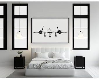 May include: A black and white framed print of an SR-71 Blackbird aircraft hangs above a white bed. The bedroom features black nightstands, black framed windows, and white bedding. The room is decorated in a minimalist style.