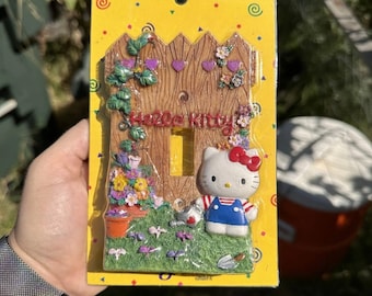 Rare 90’s  Hello Kitty Garden Switch Plate