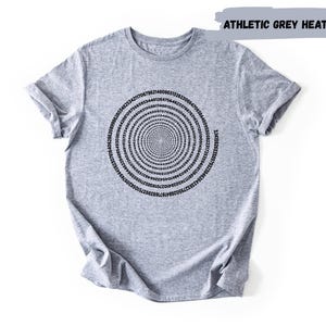 A gray t-shirt with a spiral design printed on it.