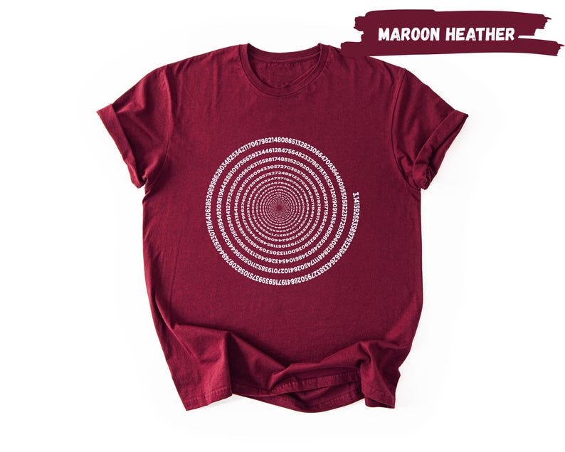 A maroon t-shirt with a white spiral design on the front.