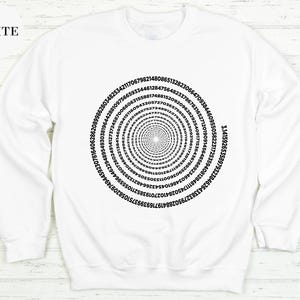 A white sweatshirt with a spiral design on the front.