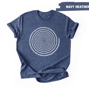 A navy blue t-shirt with a white spiral design on it, displayed against a white background.