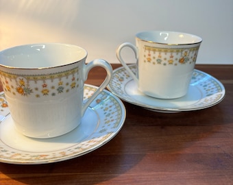 Pair of “Garden Bouquet” Fine China Tea Cups and Saucers