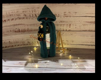 The Hooded Cloak with Lantern Wine Bottle Cover Knitting Pattern