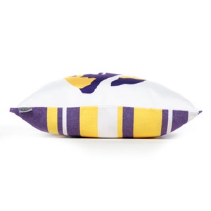 side view of a LSU Eye of the Tiger purple and gold square pillow