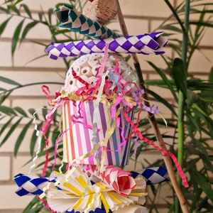 Party time - hand made toys for small to medium pet birds using safe materials that encourage natural behaviors.