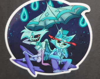 Puede incluir: Una pegatina con dos personajes de dibujos animados, uno azul y otro morado, bajo un paraguas azul con gotas de lluvia brillantes. El personaje azul tiene ojos rojos y una corbata de lazo, mientras que el personaje morado tiene un sombrero de copa y una corbata de lazo.