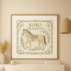 May include: A framed print featuring a tan horse with a saddle, surrounded by a green rope and leaf design. The text "KOKO Framing" is at the top. The frame is brown.