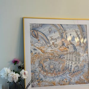 May include: A framed artwork with a gold border, depicting a whimsical scene with hot air balloons, a rainbow, and architectural elements in shades of blue, gold, and white. A vase of white and pink flowers sits nearby.