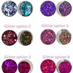 Peut inclure: Image pr&eacute;sentant six options de paillettes circulaires. Le texte "Color-shifting Glitter pt. 1" est en haut. Chaque option est num&eacute;rot&eacute;e et pr&eacute;sente une combinaison de couleurs distincte, dont des bleus, des verts, des violets et des roses.