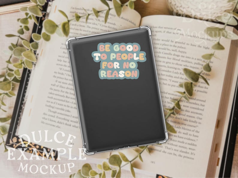 May include: A black phone case with a sticker that reads "Be good to people for no reason". The sticker has a retro, colorful design.