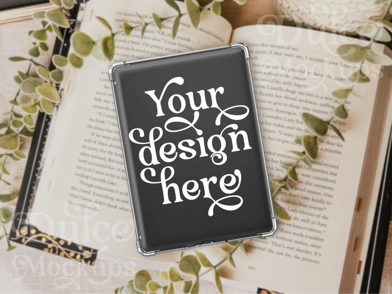 May include: A black phone case with a silver border. The case has the text "Your design here" in white lettering.