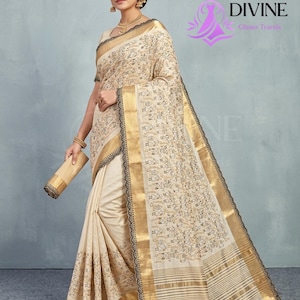 cream zari embroidery saree for wedding
designer indian cream saree with zari work
elegant festive saree with embroidery
party wear cream zari saree for women
traditional indian zari work saree
bridal cream embroidery saree look
rich zari saree ethnic outfit,zari saree cream,
embroidery saree,
cream saree,
wedding saree,
party wear saree,
indian saree,
festive saree,
designer saree,
ethnic saree,
zari work saree,
saree for women,
traditional saree,
elegant saree,