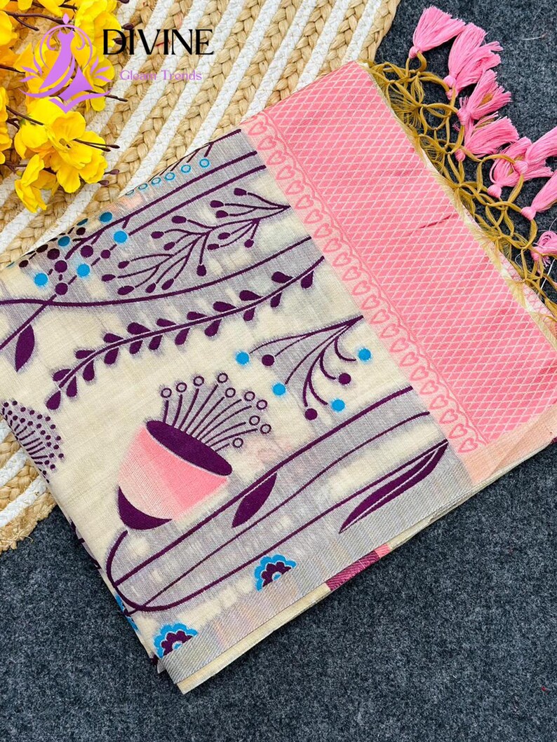 Floral linen saree pastel color Indian saree
Designer saree with printed pallu tassels
Soft cotton linen saree elegant floral design
Traditional Indian saree modern pastel style
Lightweight festive saree with blouse piece