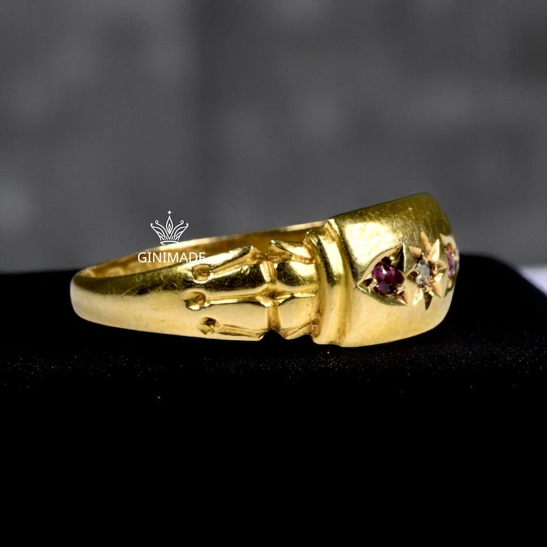 starburst pinky ring on hand styled