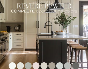 May include: A kitchen island with a dark gray base and a white countertop. The island has a sink and a faucet. There are three bar stools with woven seats. The kitchen cabinets are white with black hardware. The text "REVERE PEWTER COMPLETE coordinating colors" is displayed above the island. A color palette of 10 circles is displayed below the island.