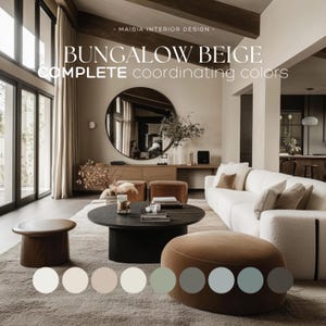 May include: A living room interior design color palette featuring a beige wall, a white sofa, a brown ottoman, a black coffee table, and a round mirror. The color palette includes shades of beige, brown, gray, and blue.