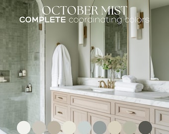 Puede incluir: Un tocador de baño con una encimera blanca y un lavabo doble. El tocador está hecho de madera clara y tiene un acabado de níquel cepillado. Las paredes están pintadas de un color verde claro. El texto "OCTOBER MIST COMPLETE coordinating colors" se muestra sobre el tocador. La imagen también incluye una paleta de colores con 8 tonos diferentes de verde, beige y gris.