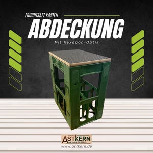 Könnte beinhalten: Ein grüner Plastikkisten mit einer Holzplatte als Deckel. Der Deckel hat ein sechseckiges Muster und der Text "ABDECKUNG" ist auf der Vorderseite der Kiste aufgedruckt. Der Text "Mit hexagon-Optik" ist unter dem Wort "ABDECKUNG" aufgedruckt.