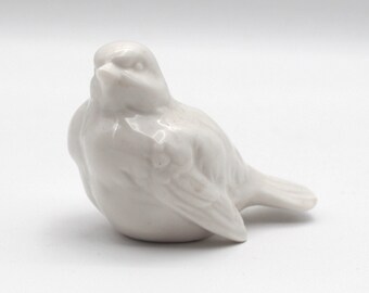 white porcelain bird figurine unpainted sparrow