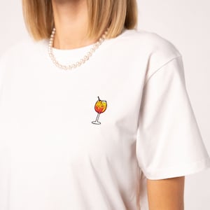 スプレー |刺繍入りレディースオーバーサイズオーガニックコットンTシャツ