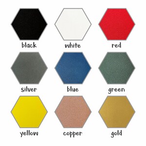 May include: Nine hexagonal color swatches in black, white, red, silver, blue, green, yellow, copper, and gold. Each swatch has a gray border and the color name written below in a handwritten style font.