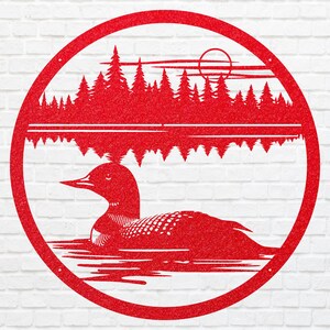 May include: Red metal wall art featuring a loon swimming on a lake, with a forest and sun in the background. The artwork is circular and has a glittery texture, mounted on a white brick wall.