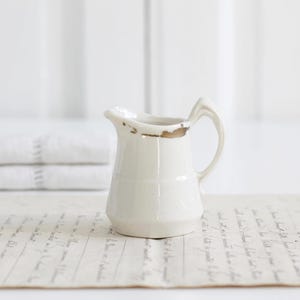 1800s Antique creamer with faded gilded decor, white ironstone tiny pitcher, milk jug, Parisian Brocante style