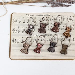 Set of 6 - Antique French cafe curtain clips, brown copper metal decorative clamps for hanging drapery or postcards, all different shades