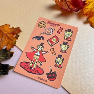 Nioween - Feuille d'autocollants en vinyle faits à la main (Halloween, Culte de l'agneau, Occulte, Culte, Dessin animé, Bande dessinée, Léopard, Émotion « Enfant intérieur » Nio)