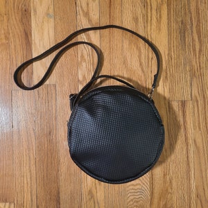 Faux Leather Black Padded Circle Cross Body Bag, Shoulder Bag, Round Purse, Handbag with Black and White Flowers Lining