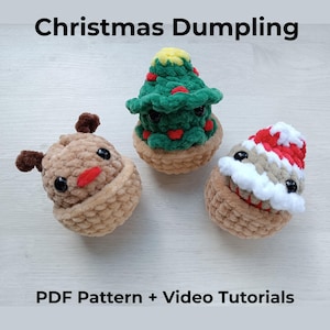 May include: Three crocheted plush figures labelled Christmas Dumpling. One is a tan reindeer with brown antlers, one is a green Christmas tree with red accents, and one is a tan figure with a red and white hat. Includes PDF Pattern + Video Tutorials.