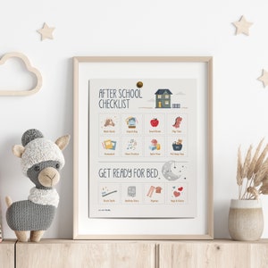 May include: A printable checklist for children to follow after school and before bed. The checklist includes activities such as washing hands, unpacking their bag, snack break, playtime, homework, music practice, quiet time, putting away toys, brushing teeth, bedtime story, pyjamas, and hugs and kisses. The checklist is framed and displayed on a shelf with a stuffed animal and a vase of dried flowers.