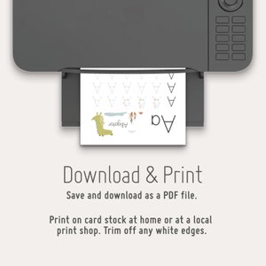 May include: A printer with a sheet of paper in the tray. The paper has a black and white illustration of an alligator with the word "Alligator" written below it. The paper also has the letter "A" written in large font at the top of the page. The text "Download & Print" is written in black font on a white background. The text "Save and download as a PDF file." is written in black font on a white background. The text "Print on card stock at home or at a local print shop. Trim off any white edges." is written in black font on a white background.