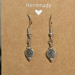 Flat circular drop earrings