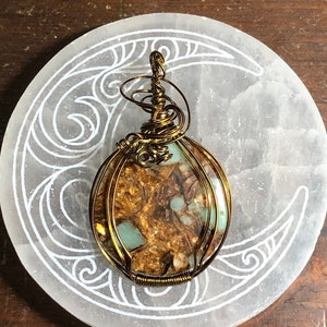 Bronzite and Regalite pendant wrapped in antique brass wire