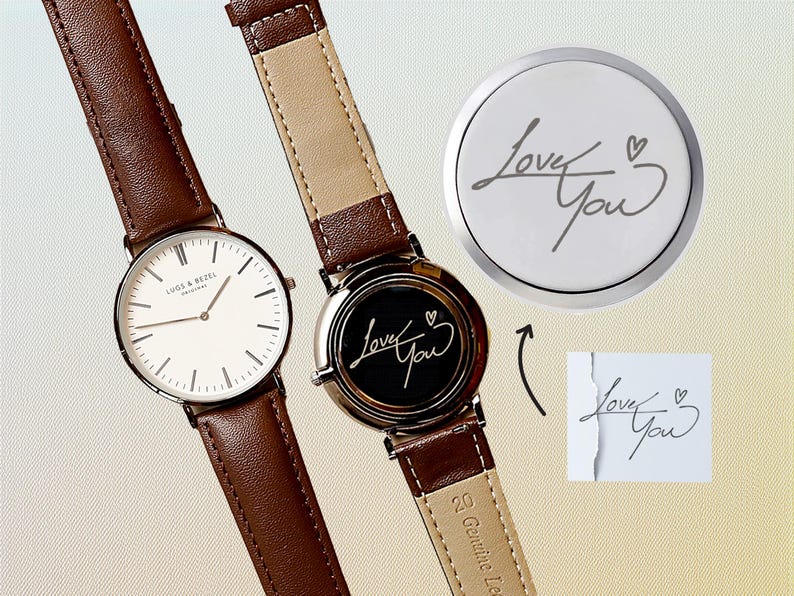 a couple of watches sitting next to each other