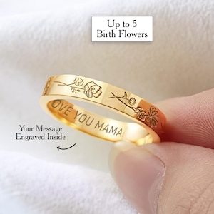 May include: Gold ring with the inscription "LOVE YOU MAMA" and floral designs. Up to 5 birth flowers can be engraved on the ring.  Your message can be engraved inside the ring.