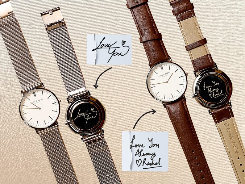 a couple of watches sitting next to each other