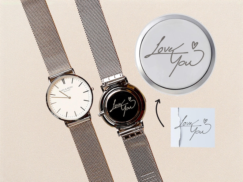 a couple of watches sitting next to each other