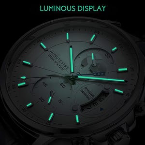 a watch with a luminous display on the face