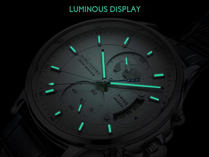a watch with a luminous display on the face