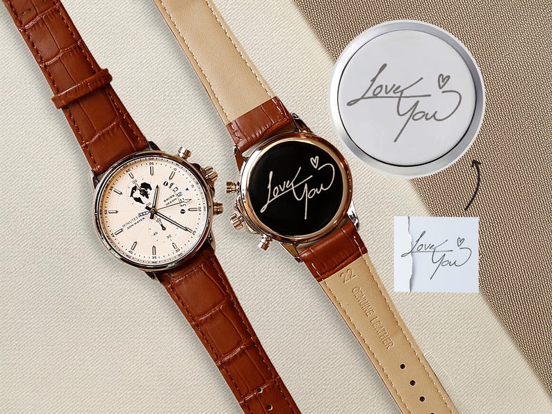 a couple of watches sitting next to each other