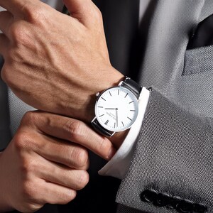 a close up of a person wearing a watch