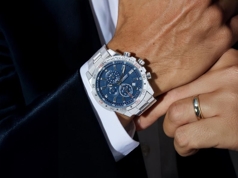 a close up of a person wearing a watch